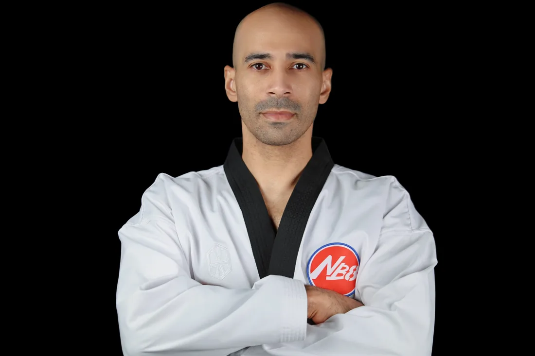Bruno Ntep en dobok, sur un tatami